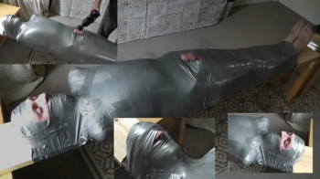 Mind the Gap; Mummified Orgasm of the Tape Bound Twink.webp