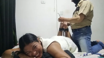 Ceci tickled on the soles by the police man.webp