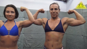 Mary vs Iron competitive female wrestling match.webp
