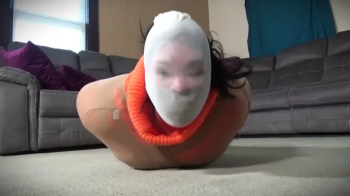 Courtney's triple hooded pantyhose encasement in chunky sweater and slouch socks.webp