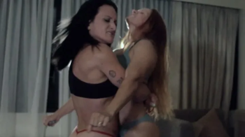 Newcomer Eva Thorne vs Tapered Physique in a Strip Submission Wrestling Match.webp