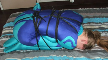 Wendy catsuit escape challenge in silicone ropes.webp