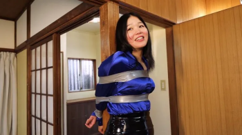 MADE IN JAPAN 10- Japanese teacher Kanon Sugawara cruelly bound and wraparound tape gagged to a post by an evil foreigne.webp