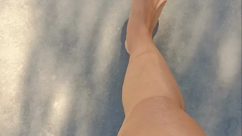 worship my feet while i walk on the sand and in the sea.webp