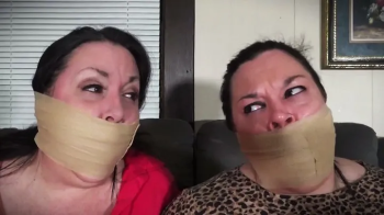 Gina surprised and instructed to tape up Courtney and double gagged.webp