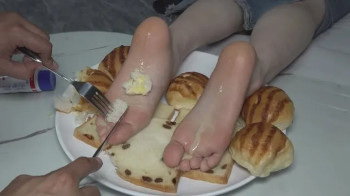 Mei Mei's feet - breakfast for champions!.webp