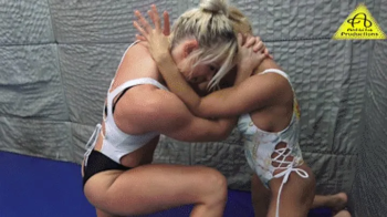 Nikki vs Viper competitive female wrestling match.webp