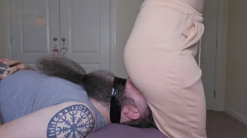 Ballgagged barefoot Agnes in shirt and shorts, hogtied with hemp rope, wiggles and wriggles on the bed (HD MOV).webp