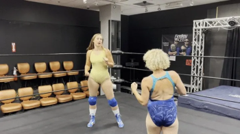 Tall Curvy Wrestler Dominates Smaller Woman.webp