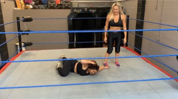 Gym wear wrestling match curvey Brunette wrestler vs toned Blonde wrestler.webp