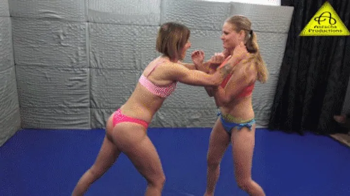 Andy vs Samantha competitive female wrestling.webp