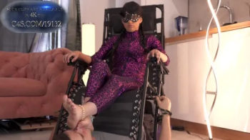 Wednesday (Susan) In Pink Catsuit And He Worship Her Feet Under - Foot Stool - Polish Language.webp