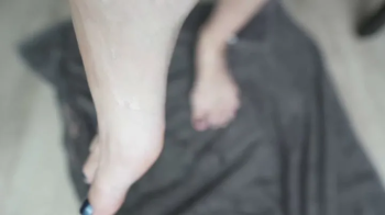 Oiling my barefeet.webp