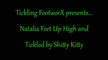 Nathalia Feet Up High and Tickled by Kitty.webp