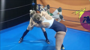 Freestyle wrestling female match in swimsuits.webp