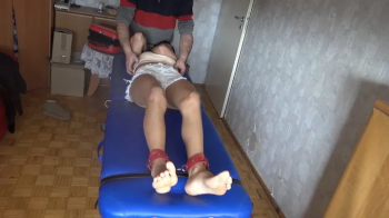 Tickling Simona Shy body on the table.webp