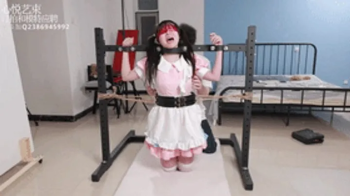 xy48-Twintail maid trapped in tickling dilemma.webp