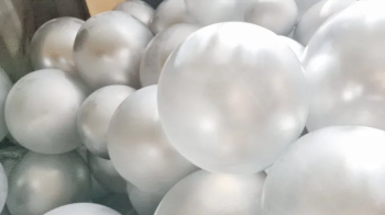 Katherine Barefoot Goddess bursting Ballons.webp