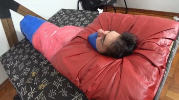 BRUNETTE PAWG KEEPING A COMPLETELY MUMMIFIED SLAVE IN CAPTIVITY AND RELEASING HIS STINKY FARTS AS PUNISHMENT BY KETLYN R.webp