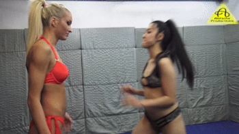 Lilly vs Hanako female competitive wrestling.webp