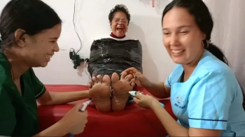 Nany is tickled on her soles- Double tickling.webp