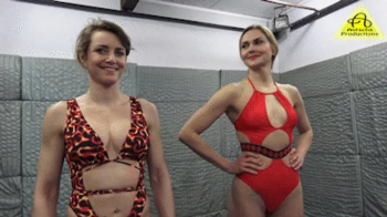 Xena vs Ginger competitive female wrestling.webp