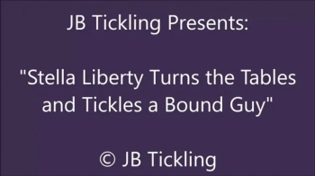 Stella Liberty Tickles A Cuffed Guy - WMV.webp