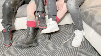 Three guys, two pairs of sneakers.webp