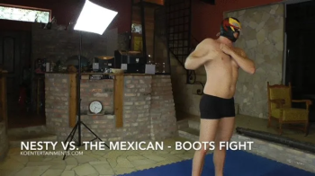 Nesty vs The Mexican - Maledom Nude Erotic in Boots.webp
