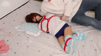 xy241-Chinese girl in gym clothes and striped stockings tied with rope and gagged.webp