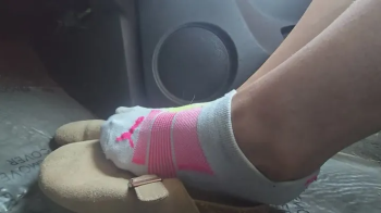 Chrissy socks and crocs in car 2.webp