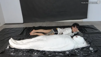 Girl Gets Plaster Bondage! (Front-on angle).webp