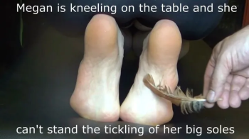 Megan is kneeling on the table and she can't stand the tickling of her big soles.webp