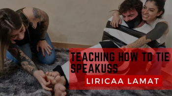 Teaching Rainbow Lau to hogtie Speakuss.webp