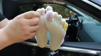 Secretly tickling in the car.webp