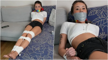 Lilly- Babysitter Gets Bound Tight, Sock Gagged and Hogtied!(4K).webp