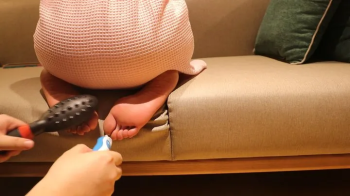 Female teacher’s bare feet were tickled on the sofa.webp