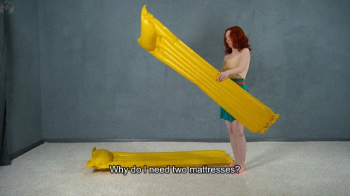 Two yellow mattresses and a duct tape bondage.webp