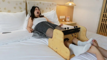 Very ticklish girl cotton stockings gets tickled in stock.webp