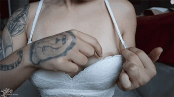 Tinies Stuck in her Bra.webp