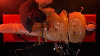 Wendy Wonder in inflatable latex sack.webp