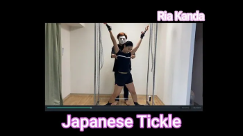 Ria Kanda - Tickling an Asian Beauty in a gym clothe with restrained on an X potision.webp