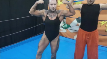 Belorussian fem bodybuilder dominates a red haired guy.webp