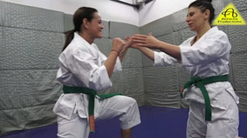 Rada vs Kim judo gi match.webp