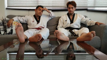 Young Karate Fighters Tickling Each Other Their Feet With Different Tickle Tools.webp