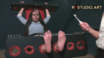 Tonya in Stocks - Cruel tickling her feet by Leya (FULL HD MP4).webp
