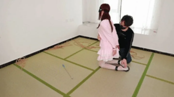xy272-Cute girl in white silk is handcuffed and shackled and tickled.webp