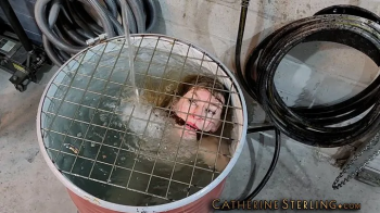 Naked but for Pantyhose, Wench with Tiny Tits is Cleave Gagged & Locked in Barrel for a Water Bondage Bath! High Definit.webp