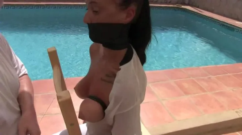 Mina Moreno - Super sexy spanish Girl Chair Tied by the Pool - Part 2 mp4 HD.webp