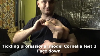 Tickling professional model Cornelia 2 face down.webp
